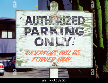 Authorized parking only sign, violators will be towed. Stock Photo