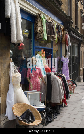 Shop selling antique clothes and bric a brac on Walcot Street BATH England UK Stock Photo