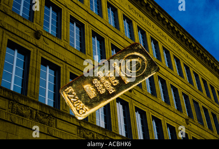 digital enhancement gold ingot in front of golden walls of swiss national bank zurich switzerland editorial use only Stock Photo