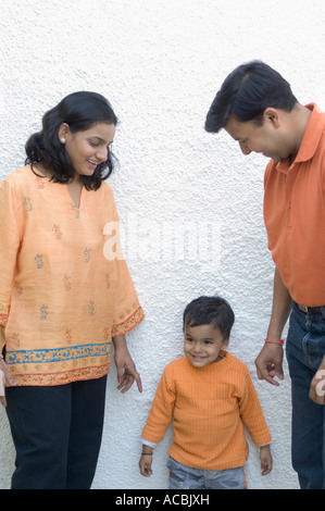Couple standing with their son Stock Photo
