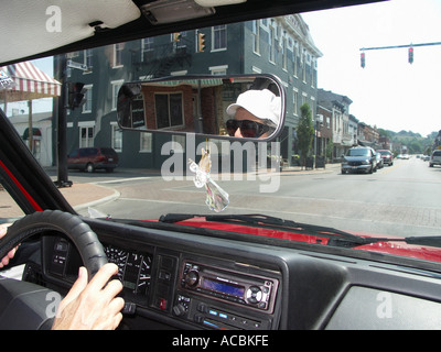 Driver at parked at Stoplight Stock Photo