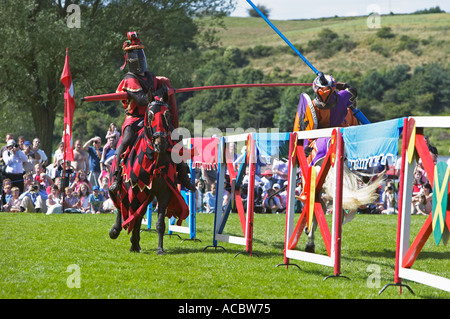 Knights jousting at an historical re enactment of a jousting tournament Stock Photo