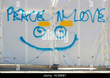 Peace n love graffiti with smiling face Stock Photo