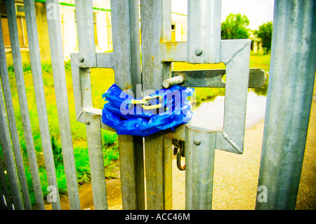 Chained metal factory gates Stock Photo