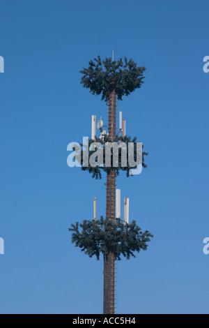 mobile phone antenna tower shaped like a tree Stock Photo