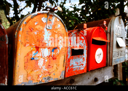 colorful country mailboxes with mail slots Stock Photo