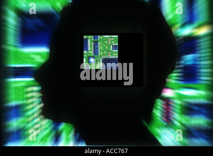 abstract view of female head superimposed over circuit board image Stock Photo