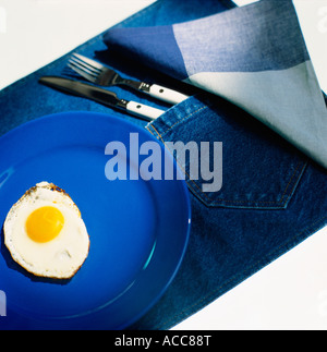 A fried egg on a plate. Stock Photo