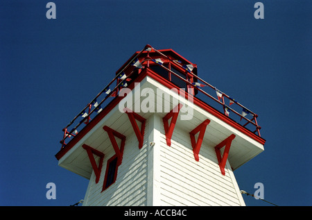 Shippagan Lighthouse in Shippagan New Brunswick Canada decorated with Acadien flags Stock Photo