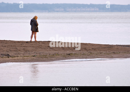 Woman Standing on Beach Lakeview Park Lorain Ohio Stock Photo