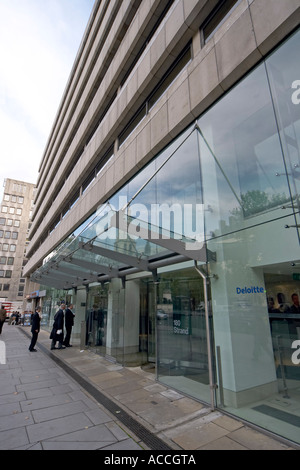 Offices of Deloitte accountants with people outside and logo on the ...