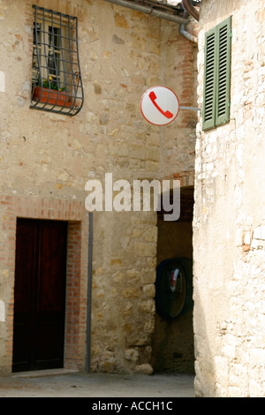 Old italian public telephone sign Stock Photo - Alamy