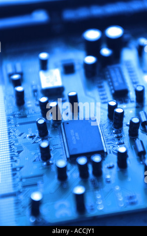 the inside workings of a computer including memory chips and other components Stock Photo