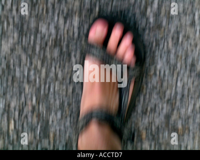 MR walking feet in sandals Stock Photo