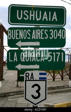 Road sign in Ushuaia showing distances to Argentina capital, Buenos Aires Stock Photo