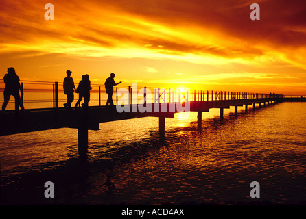 Port Austin Pier on Saginaw Bay of Lake Huron at sunset, Michigan Stock Photo