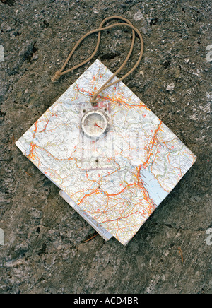 A map and a compass. Stock Photo