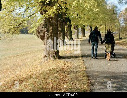 A family walking on a country road. Stock Photo