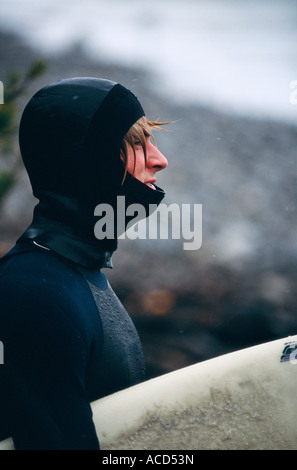 A surfer wearing wetsuit. Stock Photo