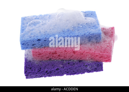Sponges with soap suds cut out on white background Stock Photo