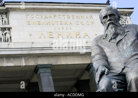 Statue of the great Russian writer Fyodor Dostoevsky in front of the building of the Russian state library Stock Photo