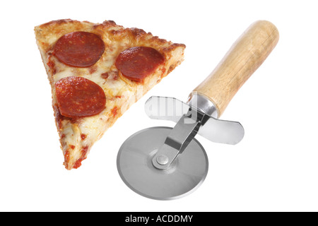 Pizza cutter and slice of pizza cut out on white background Stock Photo