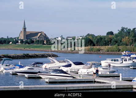 Bouctouche Marina with catholic church in background Bouctouche New Brunswick Canada Stock Photo