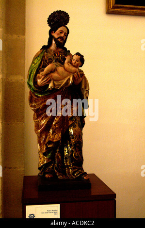 Figurine figure of San Jose con el Nino by Pedro Roldan 1664 Stock Photo