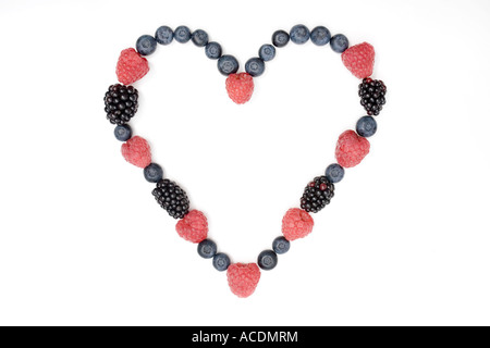 Berry heart made from English summer berries on a white background Stock Photo