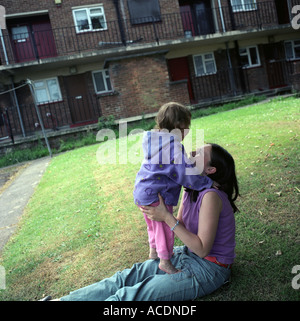 A young single mother with her daughter in a council estate, Bristol, UK. Stock Photo
