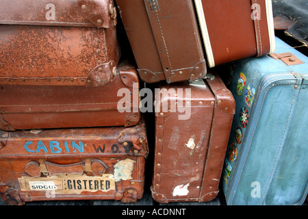 Old fashioned Suitcases on the platform Dorset UK Stock Photo