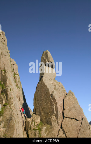 man climbing next to Napes Needle Great Gable Lake District Stock Photo