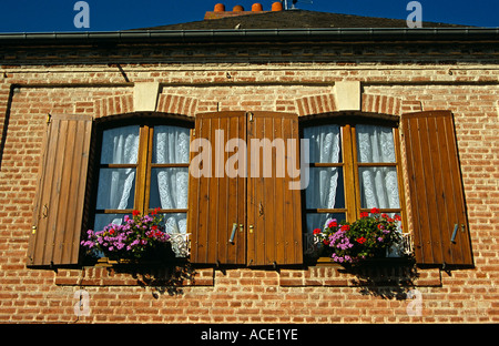 Windows and flowers, Beuvron-en-Auge, Normandy, France Stock Photo