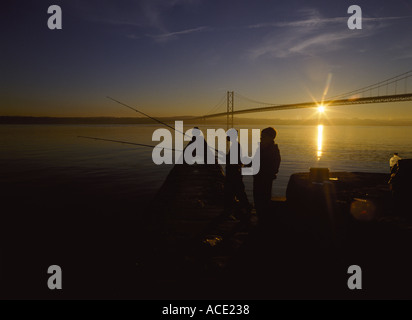 dh Boys fishing ANGLERS UK Sunset children angling scotland uk youths rods fife rod fishing
