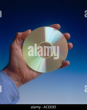 Hand holding a compact disc Stock Photo