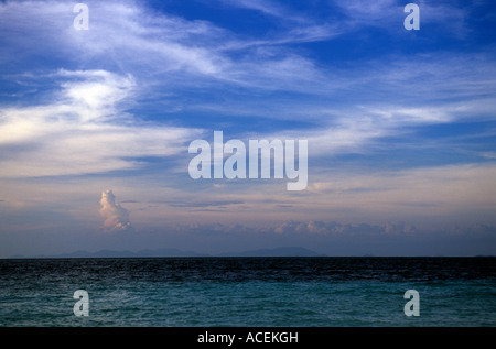 The Island of Borneo, across the Celebes Sea, as seen from Sipadan Island. Stock Photo