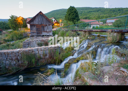 Gacka river source in evening, remains of old mills Croatia, Europe Stock Photo