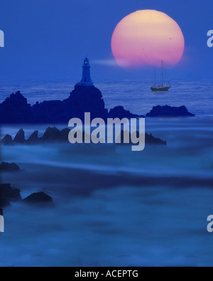 GB - JERSEY: Sunset at La Corbiere Lighthouse Stock Photo