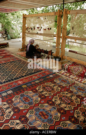 Weaving a kilim, Cappadocia, Turkey Stock Photo
