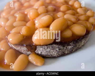 close up of baked beans on organic toast Stock Photo