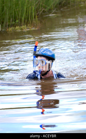 Competitor in the annual World Mountain Bike Bog Snorkelling Championships at Llanwrtyd Wells Powys UK Stock Photo