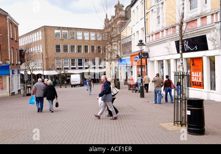 Carmarthen town centre Carmarthenshire West Wales UK people shopping in modern and traditional pedestrianised street Stock Photo