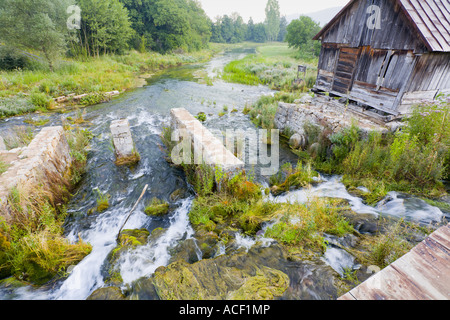 Gacka river source, remains of old mill Croatia Stock Photo