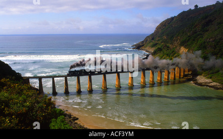 Outeniqua Choo-Choo crossing Kaaimans River Mouth on a bridge Wilderness, Western Cape; South Africa Stock Photo