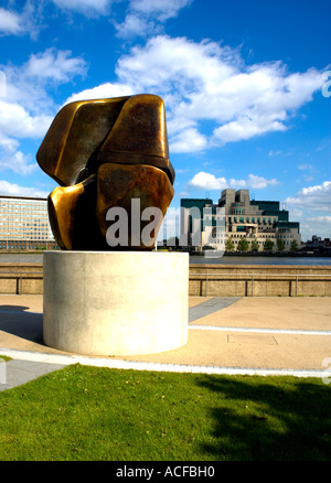 Sir Henry Moore's Sculpture 'Locking Piece' on Millbank, London. MI6 HQ in distance. Stock Photo