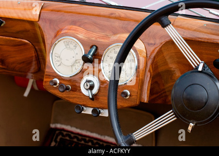 Wooden dashboard in a old car Stock Photo