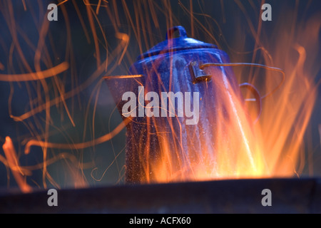 camping kettle over fire Stock Photo - Alamy