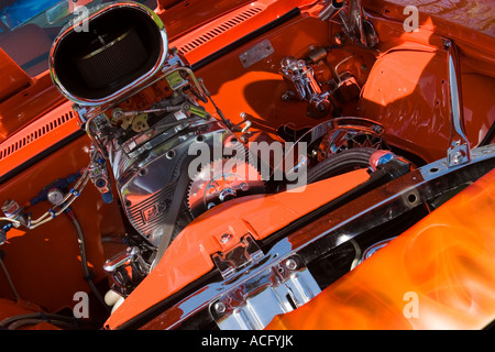Modified turbo engine under the hood of an orange 1969 Pro Street Chevrolet Camaro classic car Stock Photo