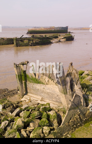 Abandoned Thames barges on the banks of the river Swale at Rasberry hill near Iwade. Stock Photo