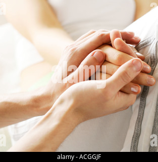 Male and female hands Stock Photo
